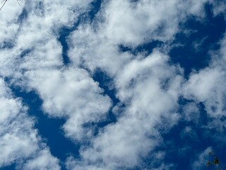 White clouds in the sky at daytime