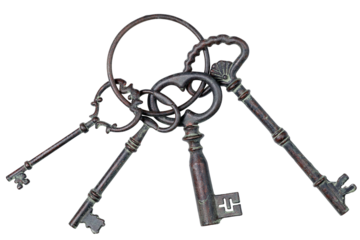 bunch of antique keys isolated on white background