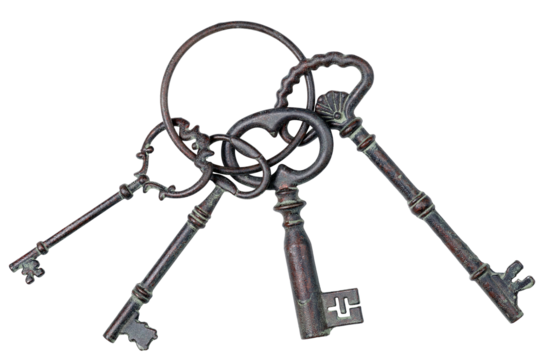 bunch of antique keys isolated on white background