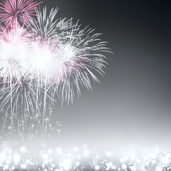 Fireworks Explode in the Night Sky with Brilliant Colors and Sparkle over a Silver Background