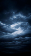Obraz premium Dark Clouds Fill the Sky with an Ominous Presence and Moody Atmosphere