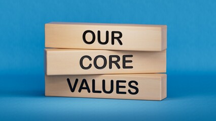 Obraz premium Our core values symbol. Concept words Our core values on wooden blocks.Business and Our core values concept. Copy space.3D rendering on blue background.