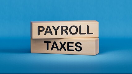 Payroll taxes symbol. Concept word Payroll taxes on wooden blocks.Business and Payroll taxes concept. Copy space.3D rendering on blue background.