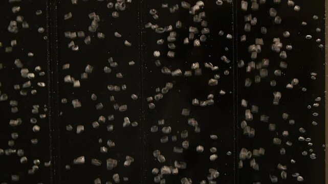 Air bubbles circulate inside the water that flows within an acrylic panel. This sustainable maintenance-free technology heals many people's hearts and mentality, and functions as partition.