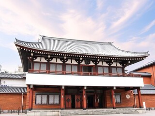 Fototapeta premium Fukuoka Red Brick Cultural Center in Japan showcasing historical architecture and vibrant red brick walls, Cityscape, Japan