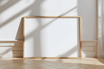 Blank wooden frame resting on light parquet floor in an airy interior space