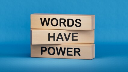 Words have power symbol. Wooden blocks with words Words have power.Business and Words have power concept. Copy space.3D rendering on blue background.
