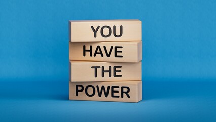 You have the Power symbol. Concept words You have the Power on wooden blocks.Business and You have the Power concept.Copy space.3D rendering on blue background.