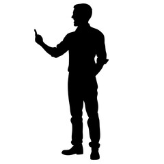 Obraz premium A man is standing in front of a white background. He is wearing a black shirt and black pants. He is holding a finger up in the air
