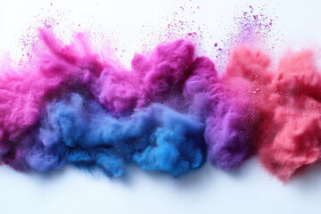Obraz premium Vibrant color explosion with blue, purple, and pink powder on white background