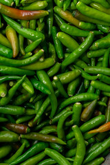 Vibrant Green and Red Chilies - High-Resolution Top Shot