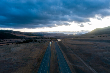 Drone shot of a mountain highway in Montana