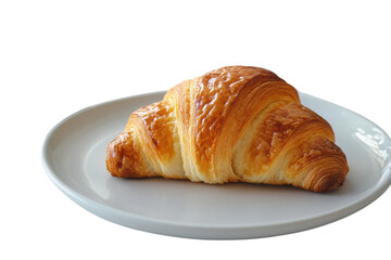 Freshly baked croissant on a white plate showcasing golden flaky layers and buttery texture