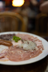 Thai style is raw pork or seafood marinated for Thai style barbecue grill or Moo Krata in restaurant. A set of Thai dish Moo krata and ingredients