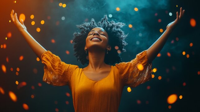 Young woman letting go of problems , and feeling free with arms in the air. Praise and worship concept.