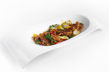 Delicious Stir-fried Crab with Black Pepper sauce on white background