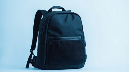 Fototapeta premium A durable black school backpack with reinforced stitching, displayed on white with visible features like mesh pockets and sturdy zippers.