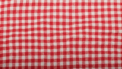 Red white checkered picnic tablecloth as background, top view	

