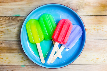 colorful ice cream sticks in a plate