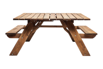 Rustic wooden picnic table set in a serene outdoor park setting during daylight hours