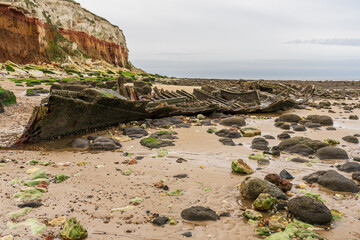 The Wreck of the Steam Trawler Sheraton and the Hunstanton Cliffs in Norfolk, England, UK