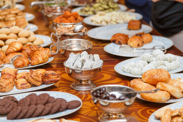 Traditional turkish desserts or local cuisine cultural tribe food on table for serve customers people taste eat and tasty drink in restaurant