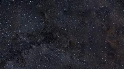 Fototapeta premium Sparse star distribution in small section of natural starry sky with thin dust