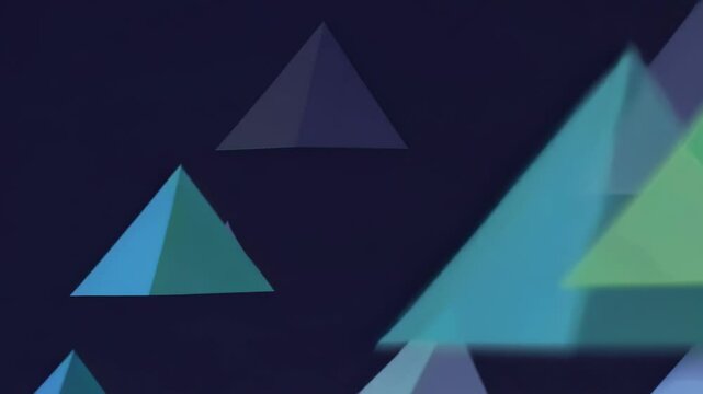Abstract geometric design featuring translucent blue and green triangular shapes on a dark background
