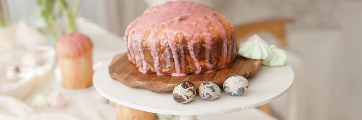 A set table for the celebration of Easter. Cakes and quail eggs on the Easter table.