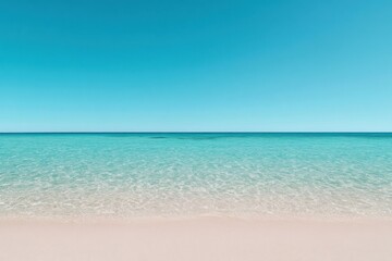 Fototapeta premium Calm turquoise water lapping on white sand beach under blue sky