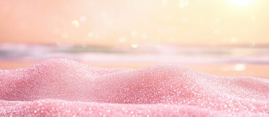 Fototapeta premium Pink sand beach with soft waves and bokeh effect in the background suitable for copy space and design projects.