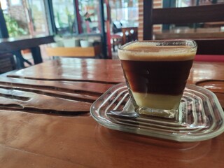 cup of coffee, in Acehnese league sanger or milk coffee arabica gayo