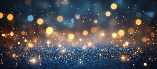 Naklejka premium Abstract bokeh lights background with glittering particles in blue and gold tones Copy Space for text.