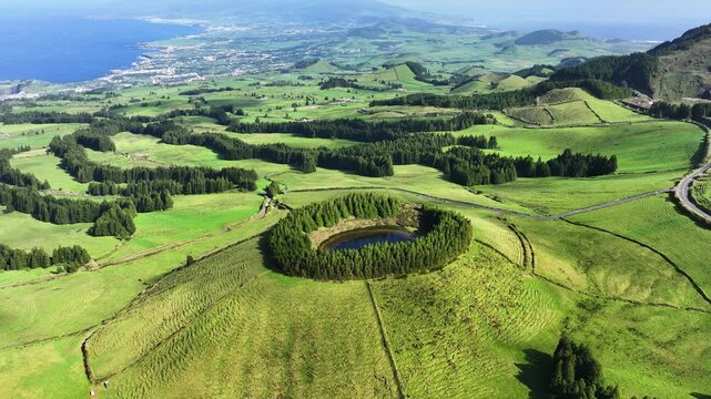 Slow aerial approach toward Lagoa do Pau Pique on Sao Miguel, Azores