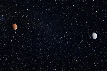 A pair of planets visible against the dark blue evening sky