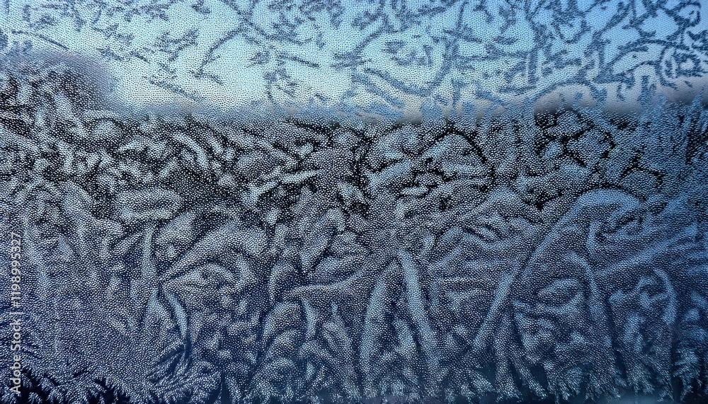 Poster intricate frost patterns on a frozen window capturing nature's delicate artistry and texture, perfec