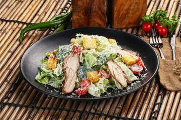 Caesar salad with chicken and romano