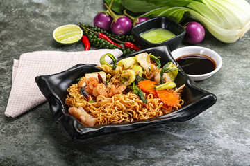 Asian cuisine - Fried noodles with seafood