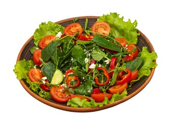 Salad with fresh ripe vegetables on the white background.