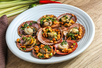 Baked scallops with scalion oil
