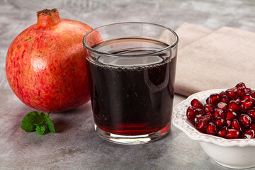 Sweet fresh pomegranate juice with fruit