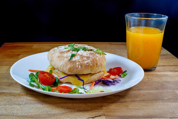 Fresh Vegetarian Sandwich with Orange Juice