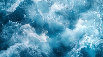 Obraz premium Dynamic waves crashing in the deep blue ocean during the daytime under bright sunlight