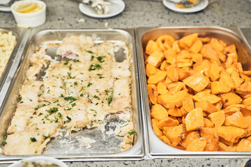 Vegetarian culinary buffet. Vegetarian buffet restaurant with culinary dishes. Baked pumpkin and baked fish. High quality photo