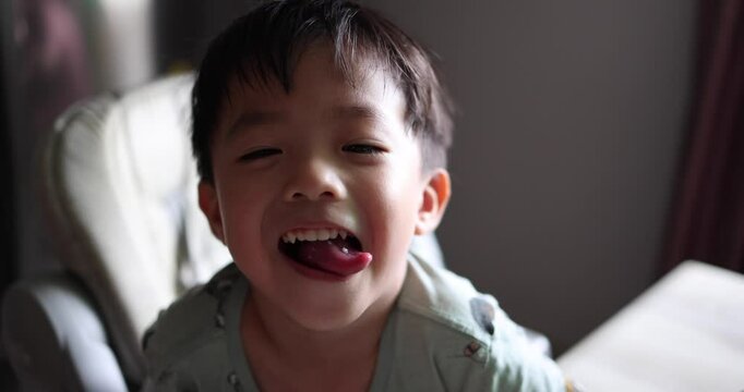 Slow Motion footage of 4 years old Asian Chinese kids in happy mode in 4K resolution
