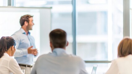 Business Presentation to Colleagues: Depicts a professional presenting ideas to a group, set against a blurred office environment, emphasizing the business context.	
