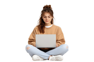Young woman with glasses sitting cross legged using a laptop, isolated on transparent background