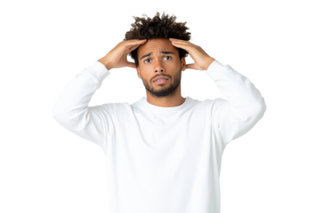 Young man with curly hair holding head in disbelief, isolated on transparent background