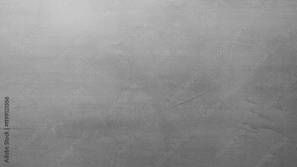 Aufkleber a grey wall with a grey background. the wall is made of concrete and has a rough texture