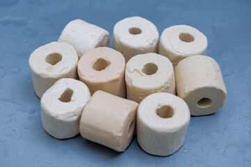 Aquarium filter media called Bio rings made of ceramic are used as water filters.